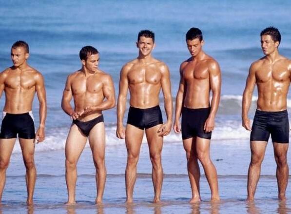 men on the beach with dilated cocks
